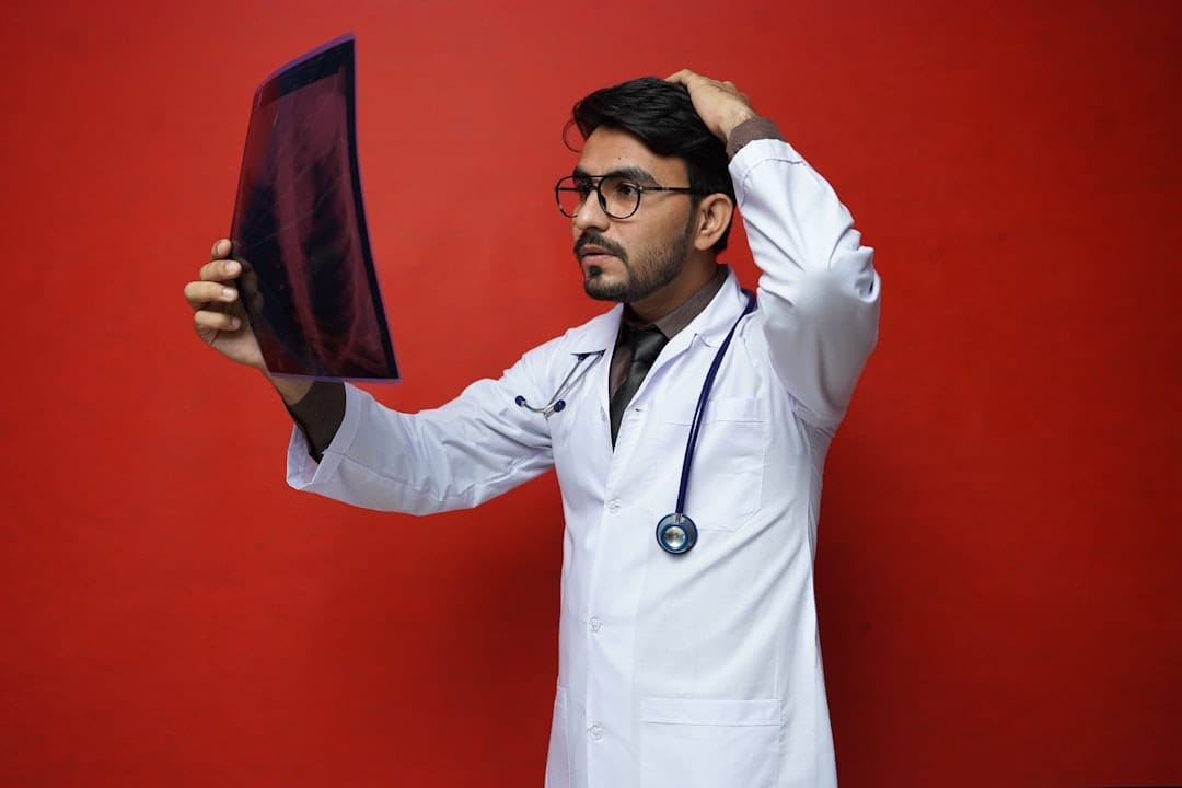 Doctor Using Tablet - ToolPeak